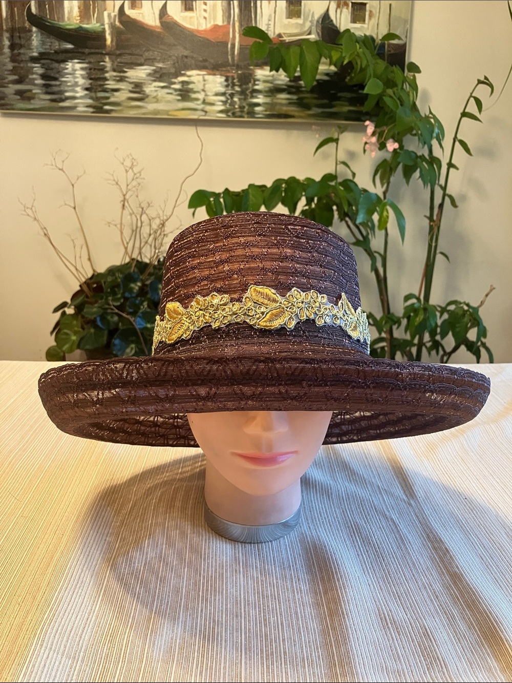 Chic Brown Wide-Brim Hat with Yellow Gold Floral Trim